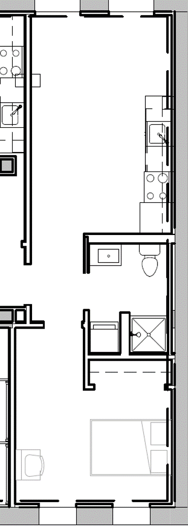 a floor plan of a house with a bedroom and a living room and a kitchen